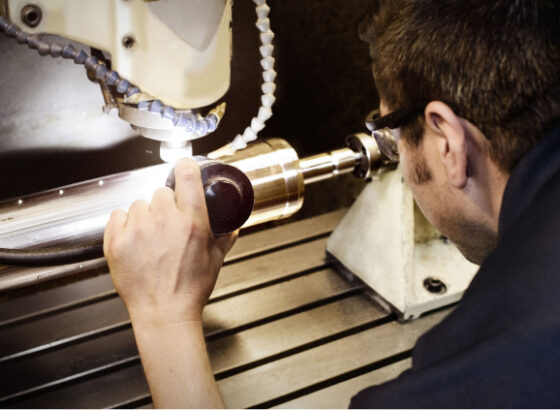 Man working on rotary die